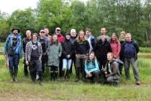 The group of Multi Peat project partners stand at a project site in Belgium